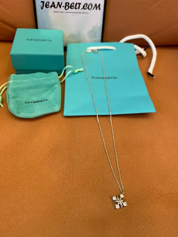 Tiffany & Co. diamond cross pendant necklace