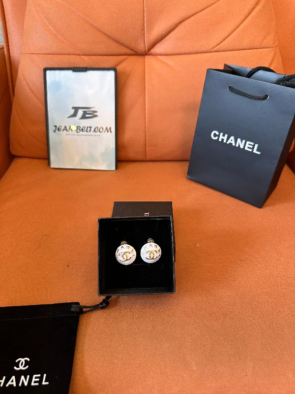 Chanel gold button earrings
